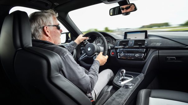 mid-Autor Rudolf Huber am Steuer des M3 CS. Foto: BMW
